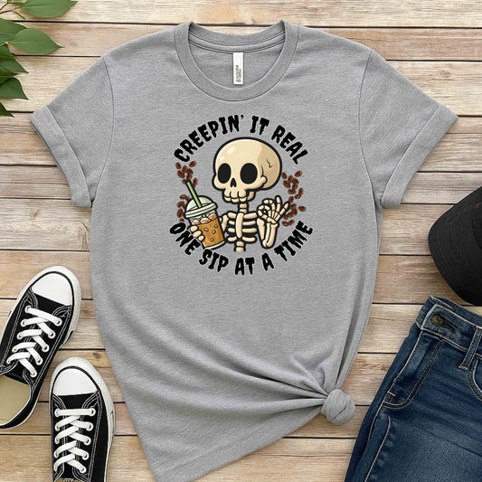 Creepin’ It Real Skeleton Coffee T-Shirt | Funny Iced Coffee Halloween Graphic Tee softstyle