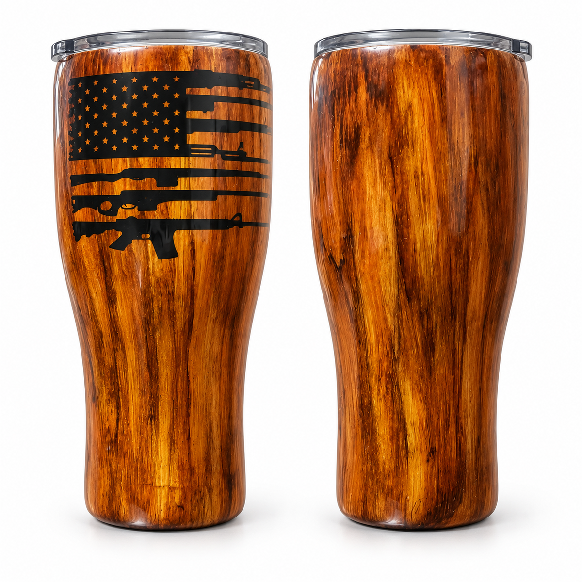Two insulated tumbler cups with a glossy brown wood-grain finish, shown from the front and side. The left cup features a black distressed American flag design with rifle silhouettes integrated into the stripes.