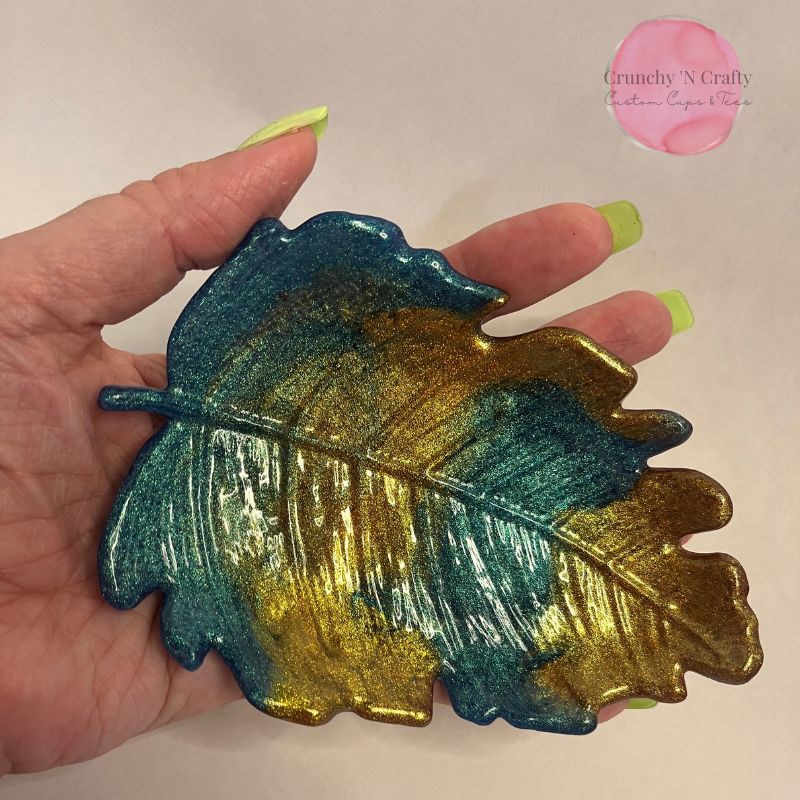 Monstera leaf epoxy trinket tray in blue and gold